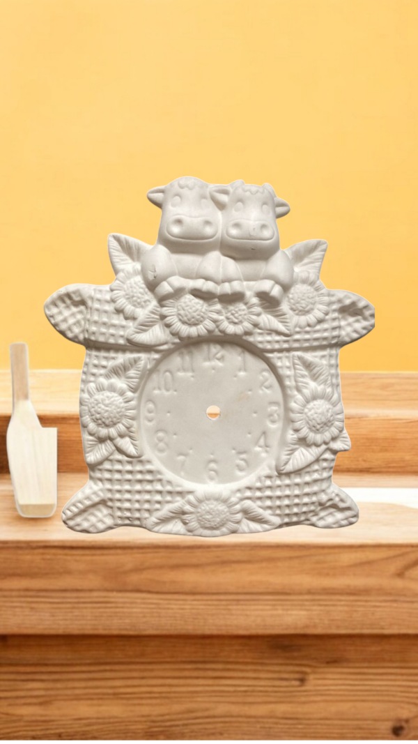 RELOJ DE VACA CON GIRASOLES